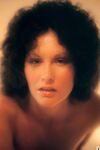 Classic retro centerfold Linda Lovelace enjoys solo masturbation on her bed