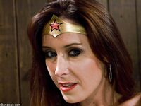 Christina Carter plays Wonder Woman during kinky Device Bondage porn shoot