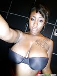 Curvaceous ebony lassie Serenity Red undressing and picturing herself
