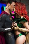 Chesty cosplay redhead Britney Amber taking a cumshot on her tongue