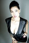 Tattooed sexy pornstar Asian showing big tits in sheer lingerie