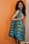 Indian amateur Divya slips out of a wrap to lie naked on a bed