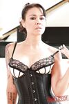 Asian MILF Dana Vespoli spreads her legs to show her pussy in black corset