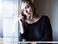 Erotic young Daniel Sea strips at her desk to spread her long legs wide open
