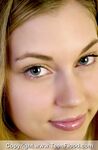 Teen first timer with a pretty face licks a nipples as she disrobes on bed