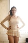 Sweet teen girl Bridgette Vaughn teases her guy in tight and see thru clothes