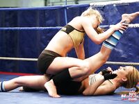 Stunning sporty lesbians get some pussy pleasure after wrestling