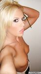 Playful blonde babe with small perky tits picturing herself