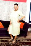Older mature Indian Kira B modelling her sexy legs non nude in sandals