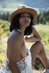 Sultry country girl Angel Constance flashes natural tits & hard nips outdoors