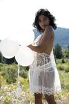 Sultry country girl Angel Constance flashes natural tits & hard nips outdoors