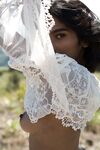 Sultry country girl Angel Constance flashes natural tits & hard nips outdoors