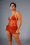 Sexy Indian pornstar Sunny Leone sheds sheer lingerie baring pierced nipples