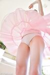 Cute ballerina looks pretty in pink sliding a glass dildo in her teen pussy