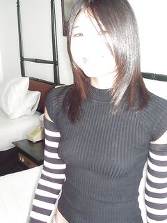 Young asian girl exposing her tiny tits and trimmed juicy cunt