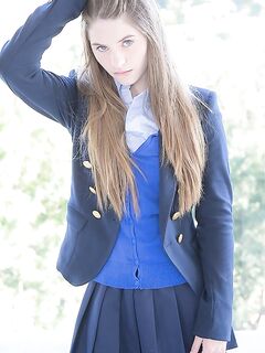 Naughty schoolgirl in uniform makes the grade on her knees