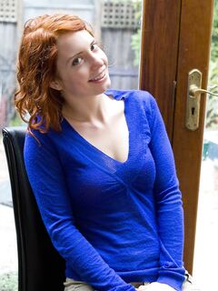 Cute redhead Kara Dashka shows her pale natural tits & spreads in the window