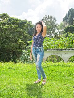 Dazzling Venezuelan girl Kim Veliz masturbates her shaved pussy outdoors