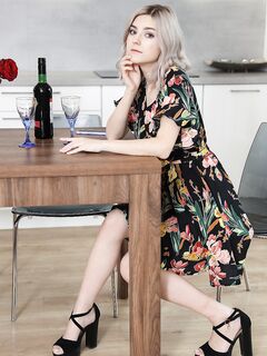 Amateur girl Eva Elfie gets totally naked after drinking wine at kitchen table
