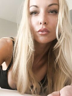 Sexy blonde Kayden Kross bares her big boobs during self shot action