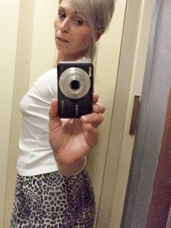Czech lady Kathy White taking selfies in the mirror while stripping