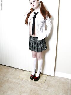 Young redheaded schoolgirl Gypsy flashing pierced upskirt pussy