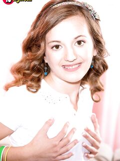 Redhead teen Marissa Mae uncovers nearly flat chest while stripping naked