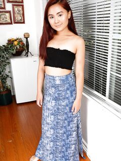 Redhead Asian teen Elle Voneva showcases her yummy feet and delicious holes