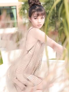 Adorable teen Sowan unveils her small titties and cute small cunt outdoors